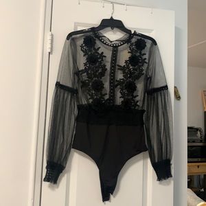 Flirty black body suit with flowers